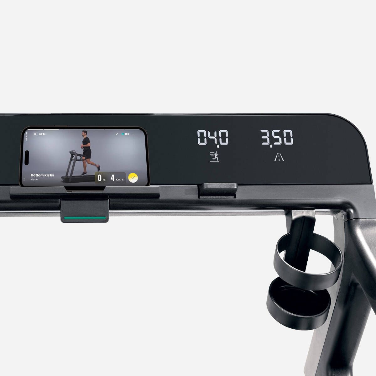 Treadmill console with a smartphone in a holder, displaying speed at 04.0 and distance at 3.50, with an attached cup holder.