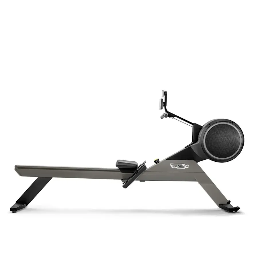 A dark grey Precor rowing machine shown from a side profile against a plain white background.