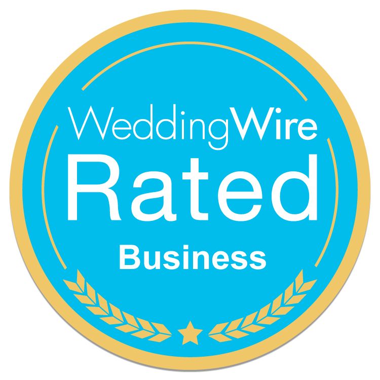 A blue badge that says wedding wire rated business