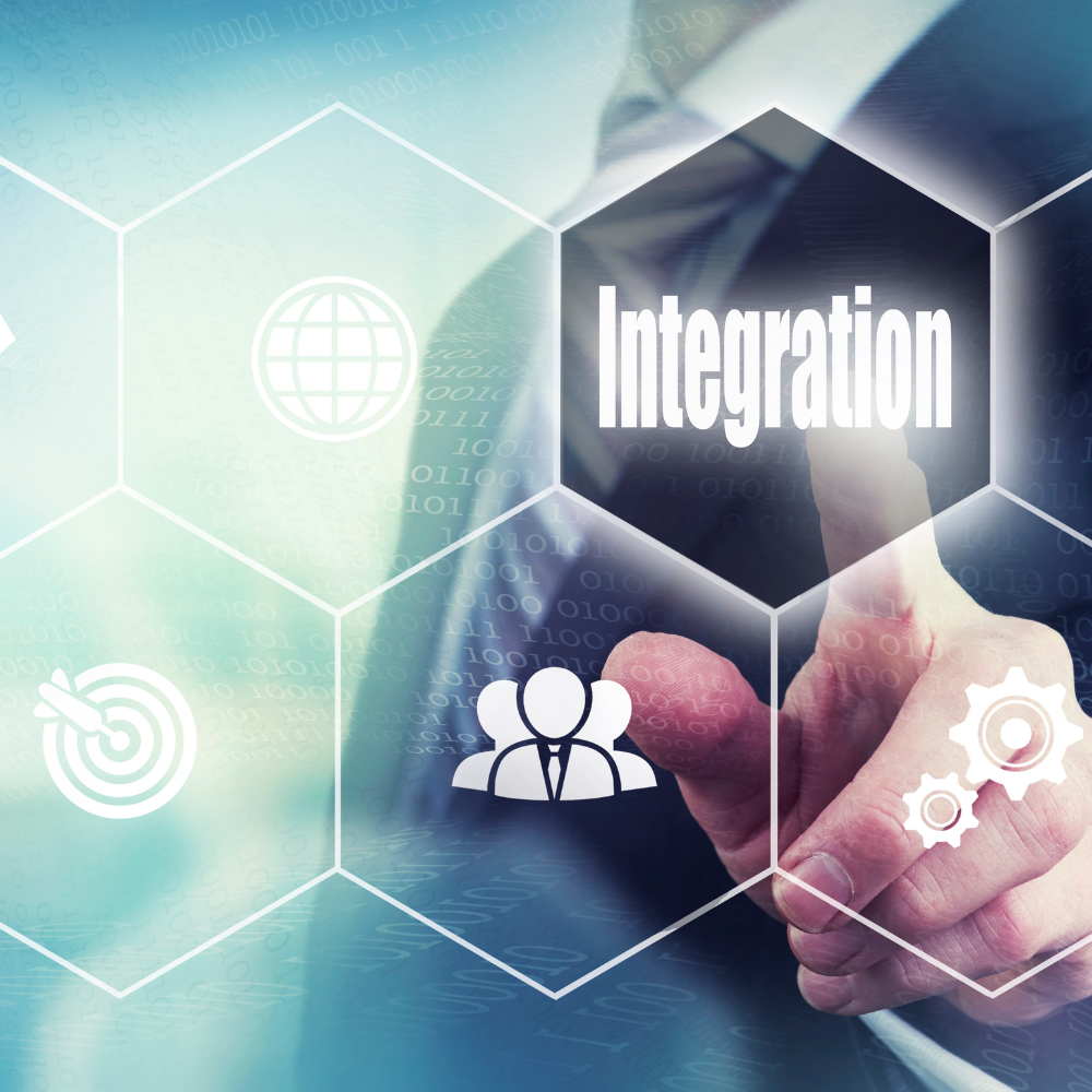 A man is pressing a button that says integration
