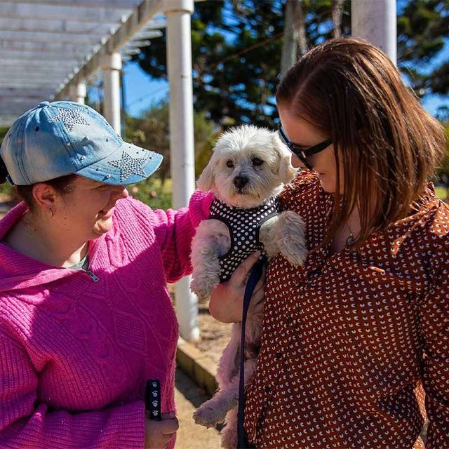 2 LADIES WITH A DOG
