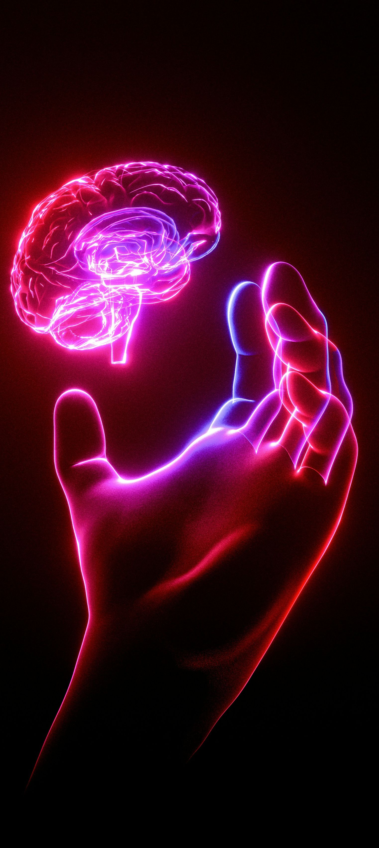 Glowing pink holographic brain hovering above an outstretched hand on a black background