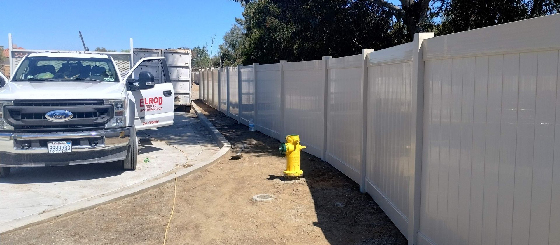 Tupelo Fence With Car — Riverside, CA — Elrod Fence Co