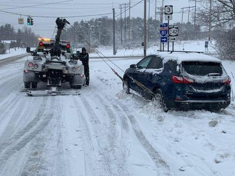 Car Being Carried by a Tow Truck — San Antonio, TX — Superior Hospice Car Being Carried by a Tow Truck — San Antonio, TX — Superior Hospice