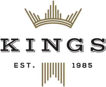 the logo for kings est 1985 has a crown on it
