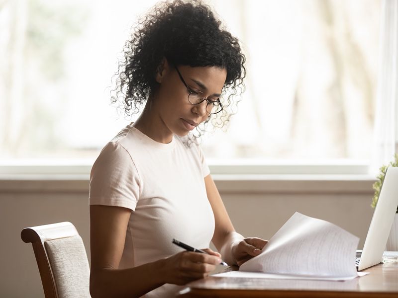 a woman filing paperwork