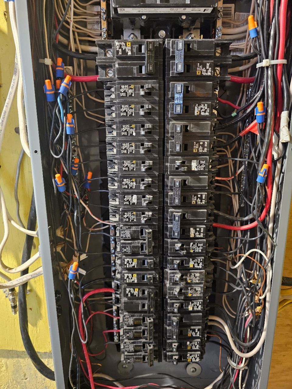 Electrical circuit breaker panel with a list of circuits.