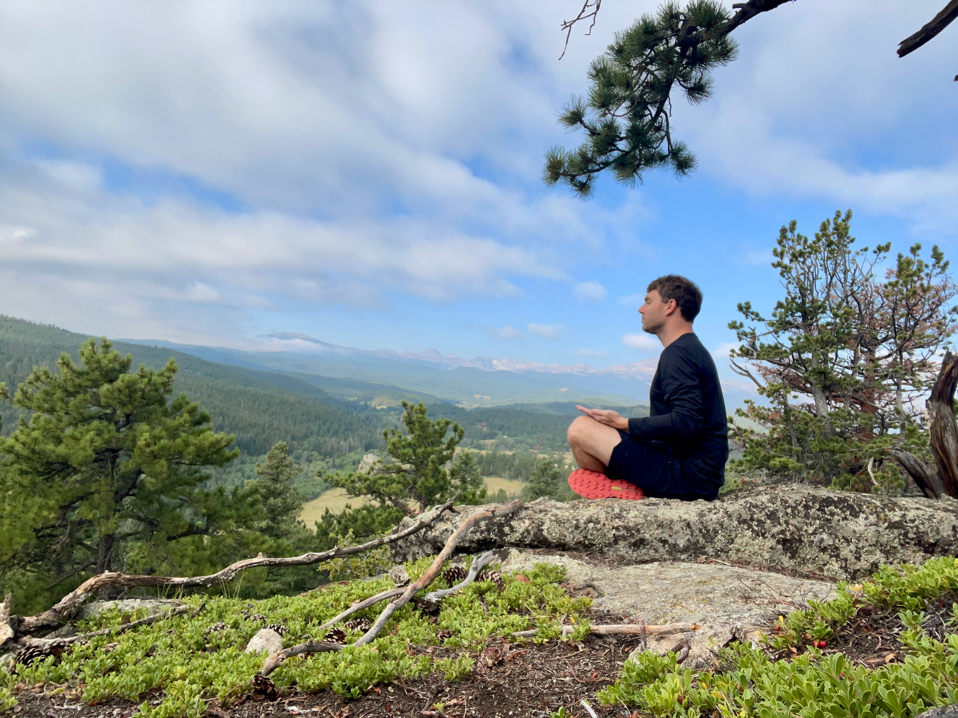 a photo of myself meditating in the mountains