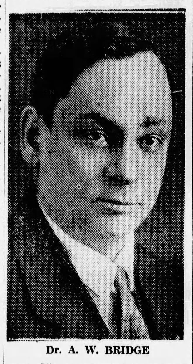 Dr. A. W. Bridge in a formal portrait, wearing a suit and tie.