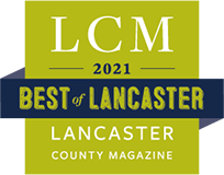 A logo for the best of lancaster county magazine.