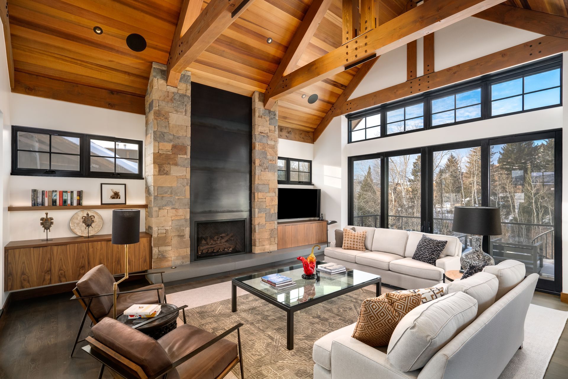 A living room filled with furniture and a fireplace.