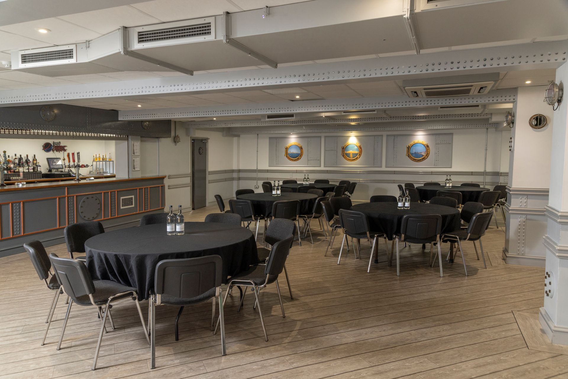 Below Decks function room with naval-inspired decor