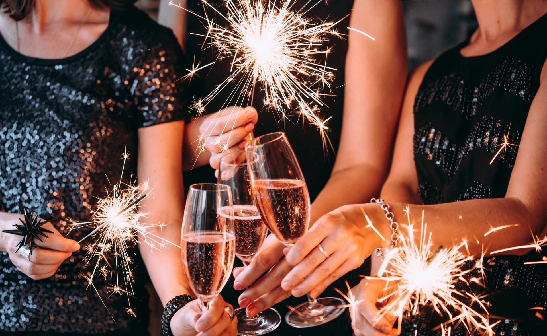 Christmas party night celebration with sparklers and champagne in Portsmouth