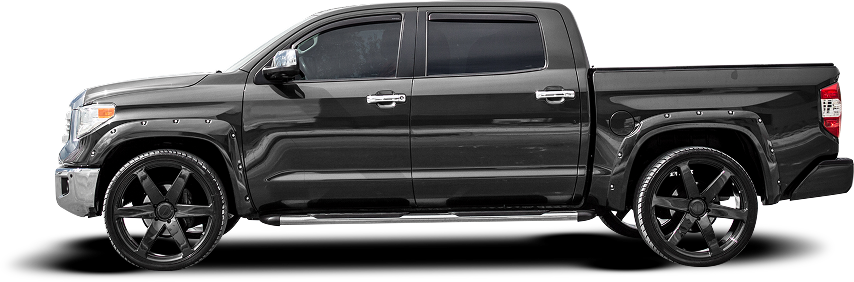Black Toyota Tundra pickup truck with black wheels and tinted windows.
