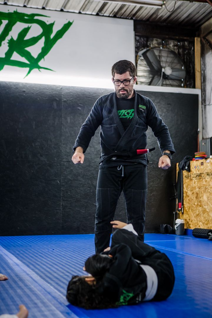 Students drill Brazilian Jiu Jitsu techniques at Artistry BJJ in Houston, TX to build calm, real confidence.