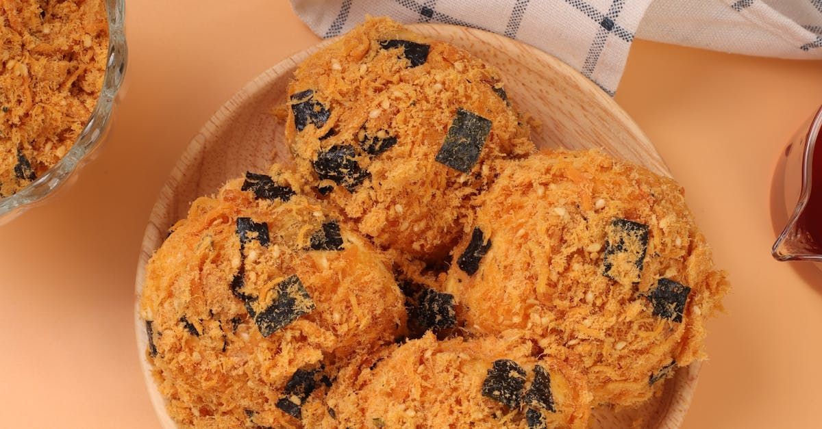 A close up of a bowl of food on a table.