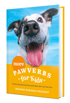 Book cover of a happy dog with orange title text on blue background: “More Pawverbs for Kids”