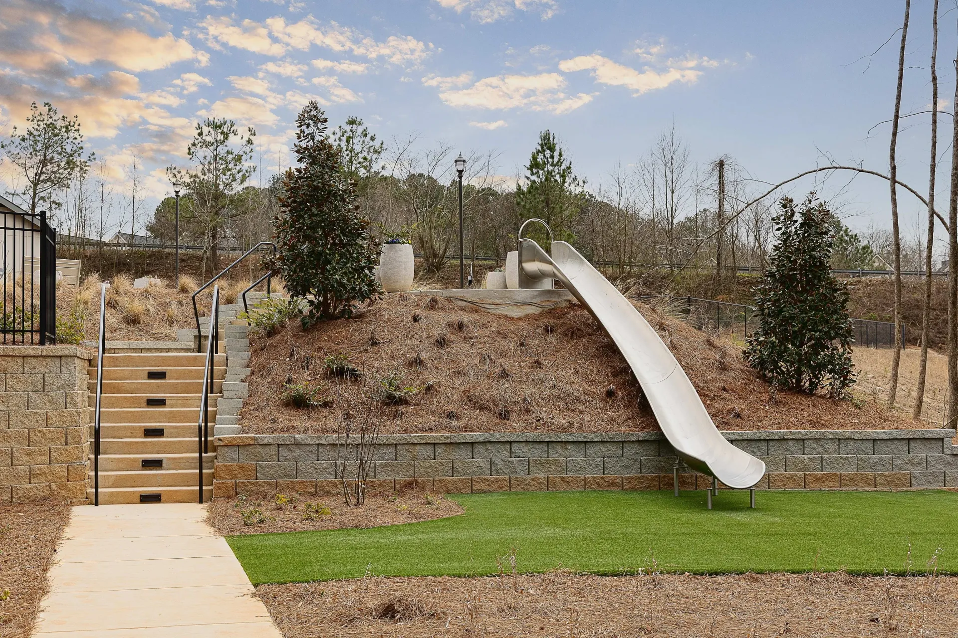 Outdoor playground with slide and stairs