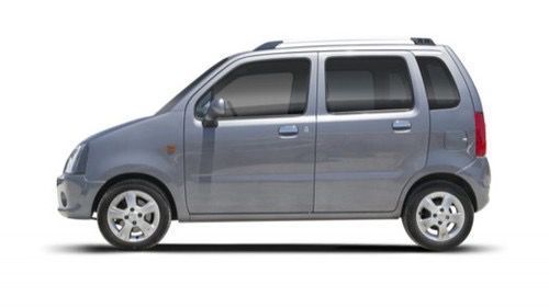 A silver minivan is shown from the side on a white background.