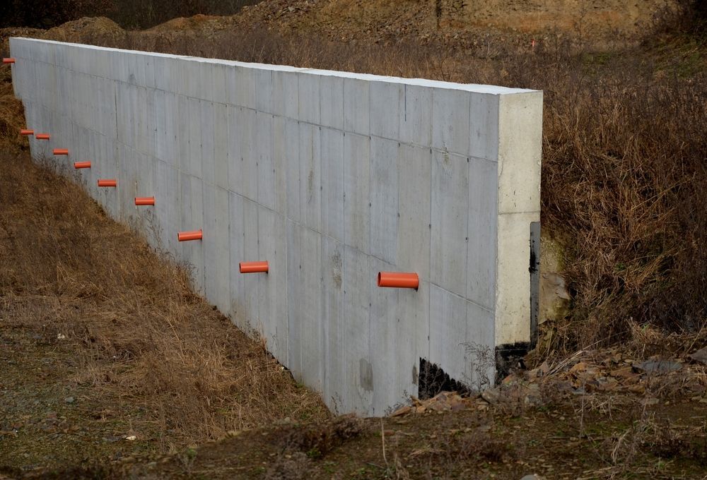 A large concrete wall is being built in the middle of a field. — Diamond Concreting In Mount Low, QLD