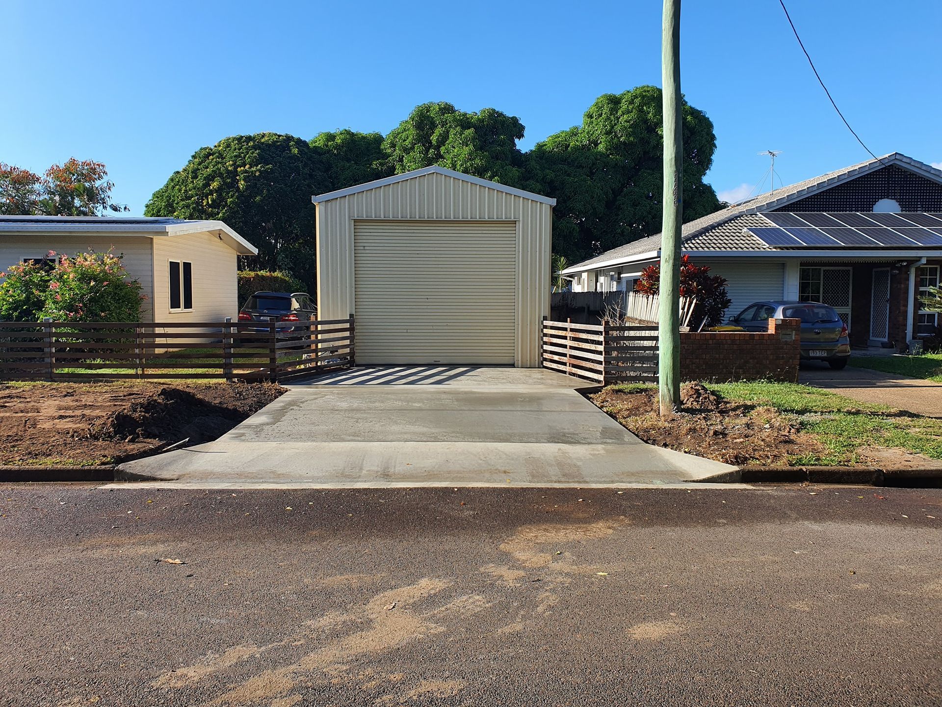 White Arrow Painted On The Side Of A Road — Diamond Concreting In Mount Low, QLD