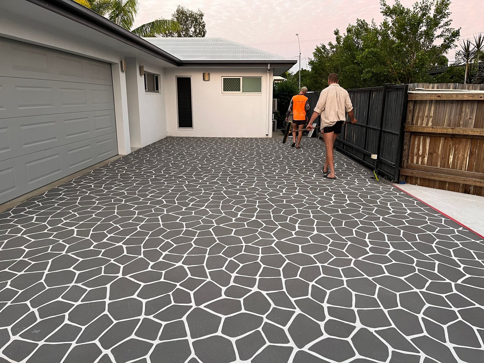 Black And White Circular Pattern On A Stone Floor — Diamond Concreting In Mount Low, QLD