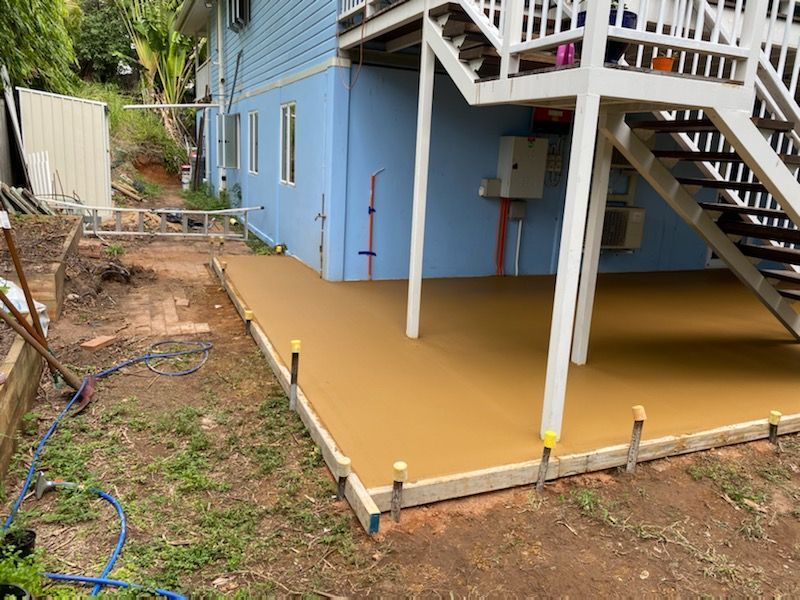 House With Stairs And A Concrete Floor In Front — Diamond Concreting In Mount Low, QLD