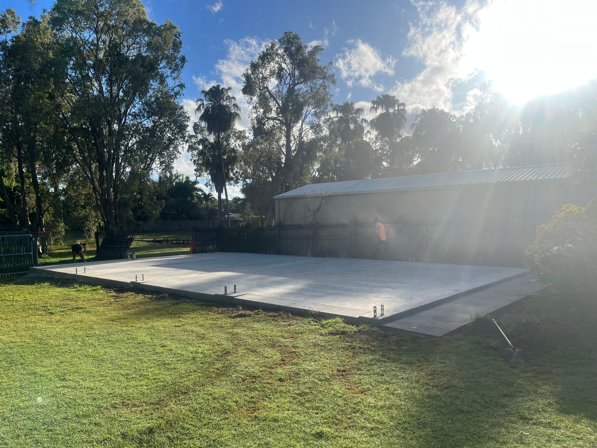 Man Using A Machine To Level A Concrete Floor — Diamond Concreting In Mount Low, QLD