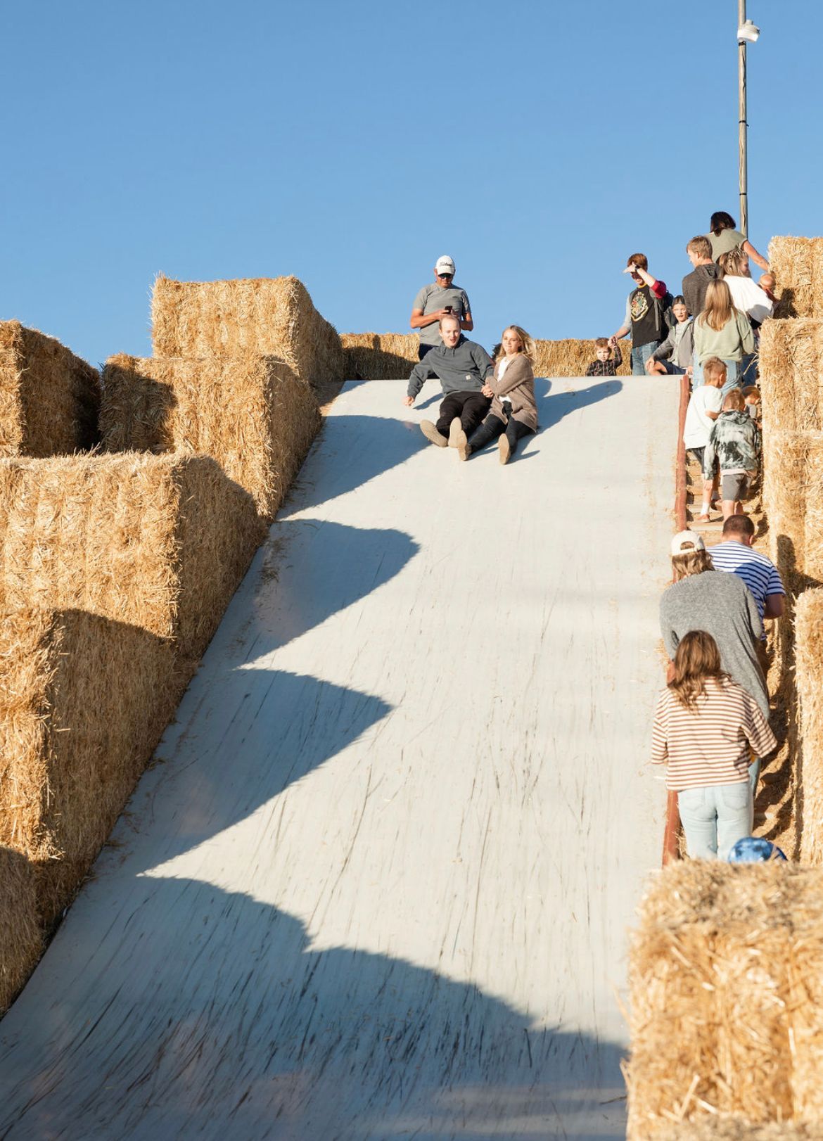 Slide at corn maze near me nighttime fall attraction in Morgan Utah