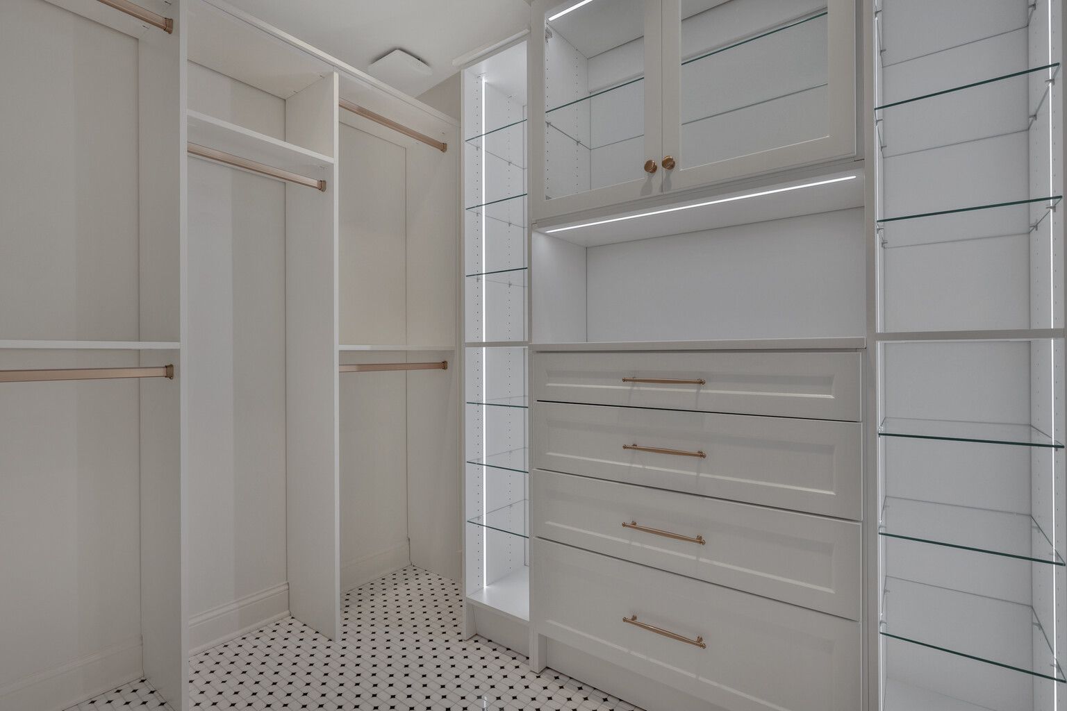 It is a walk in closet with lots of shelves and drawers.