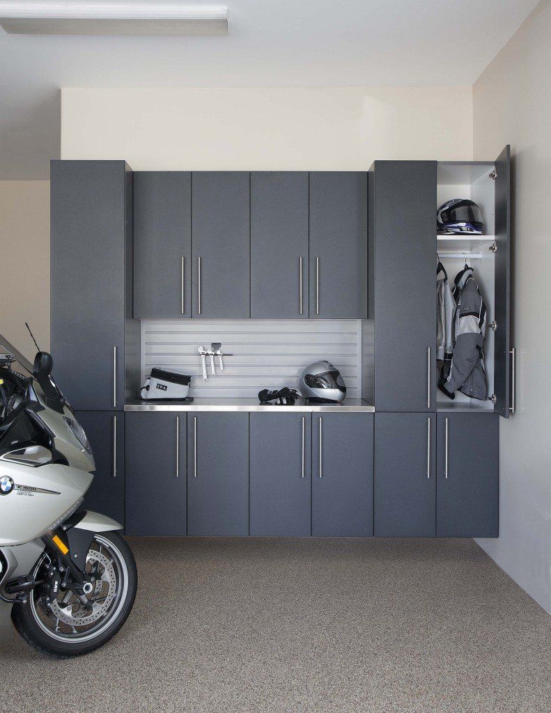 A bmw motorcycle is parked in a garage