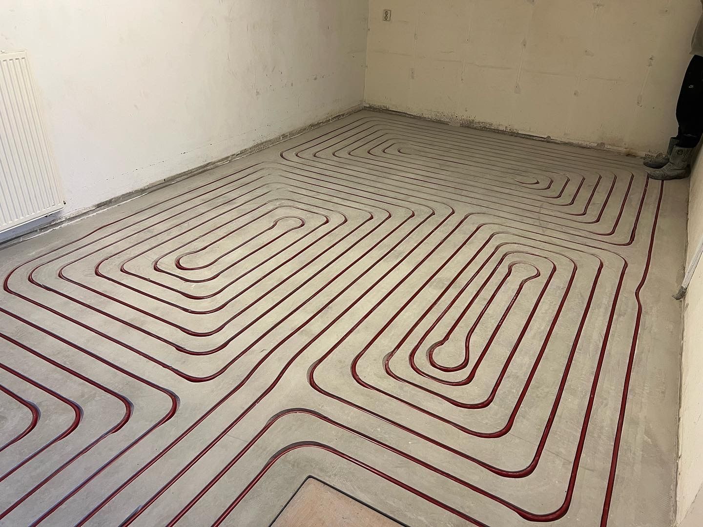 Vloerverwarming buizen op een staalmat