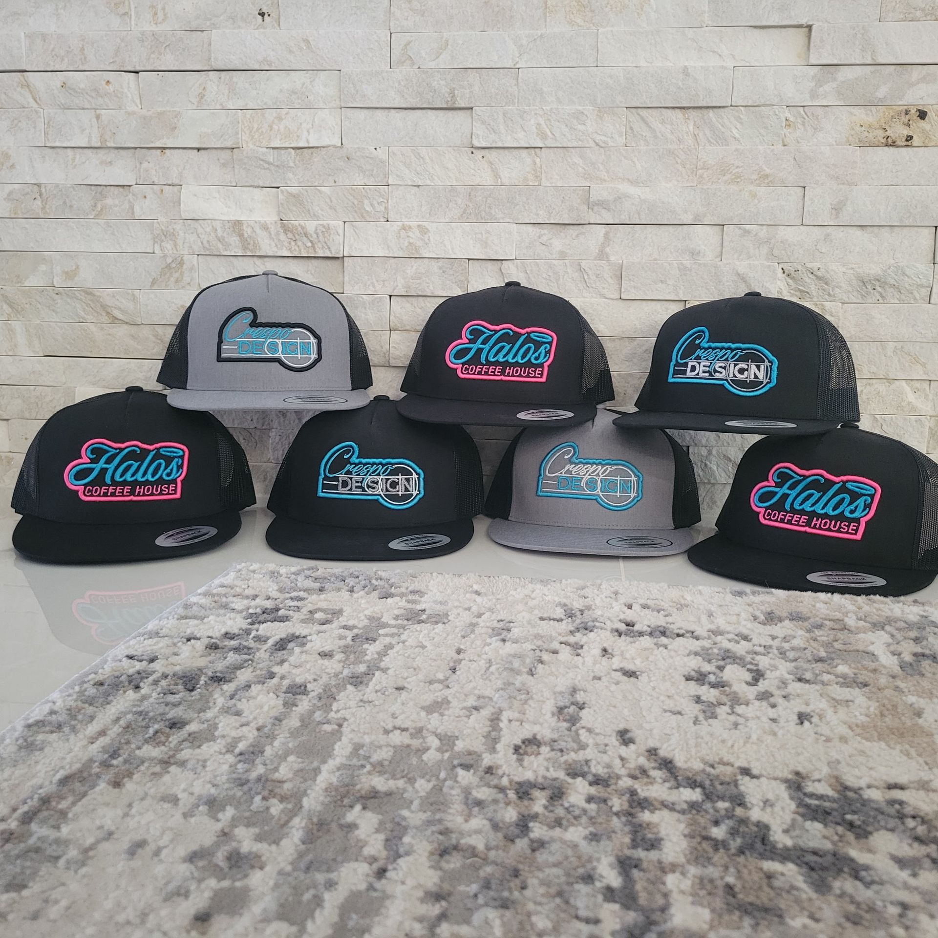 A group of hats with the word halos on them