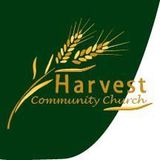 the logo for the harvest community church is a wheat ear on a green background.