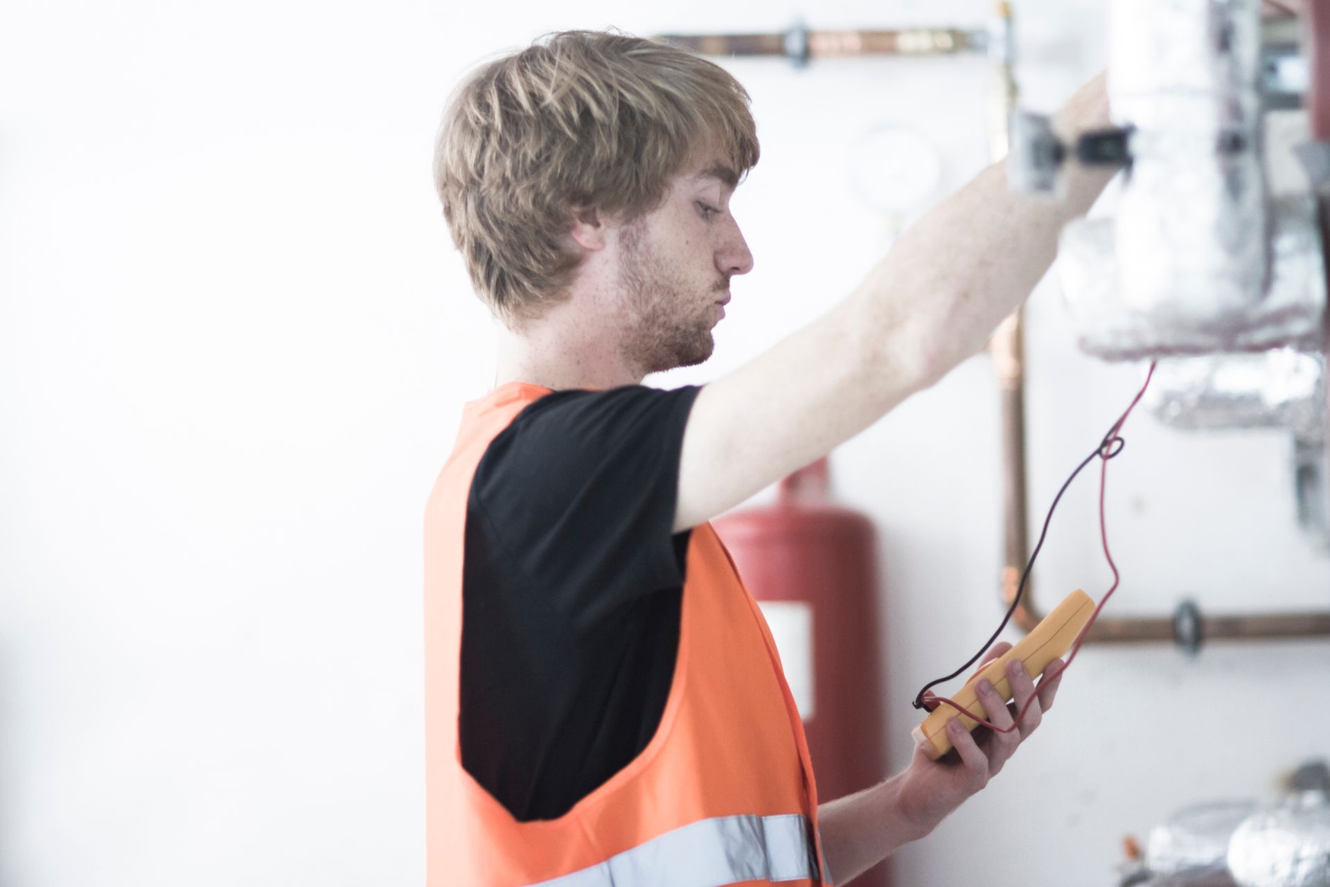 HVAC professional evaluating equipment for a gas line project in Southwest Missouri