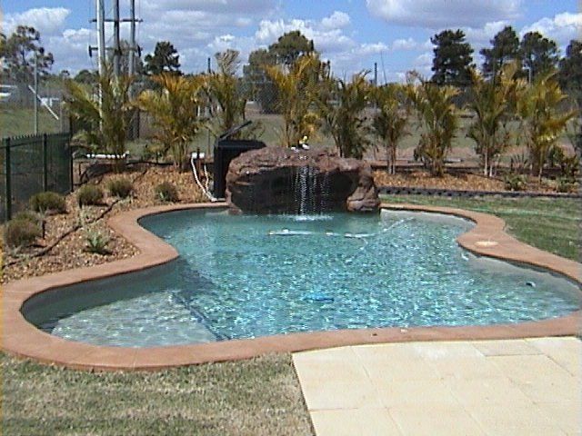 Waterfalls On The Edge Of The Pool — Bundaberg, QLD — JJ's Pools & Spas