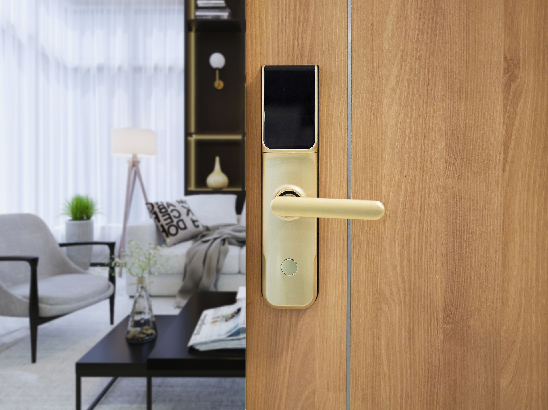 Gold Smart Door Lock on a Wooden Door, Open to a Modern Living Room With Neutral Tones — North East Locksmiths in Wodonga, VIC