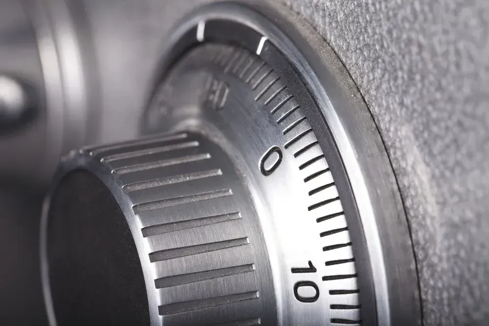 Close-Up of a Safe Dial, Showing Numbers and Tick Marks on a Silver Surface — North East Locksmiths in Wodonga, VIC