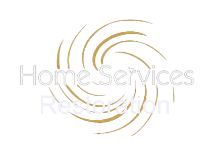 A logo featuring gold, swirling lines arranged in a circular, spiral pattern against a white background.