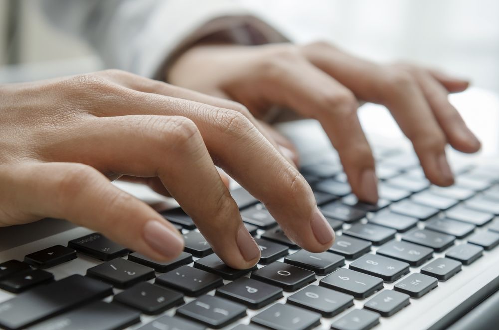 A Close Up Of A Person 's Hands Typing On A Keyboard — Dateline Computers Authorised Jaycar Reseller In Bowen, QLD