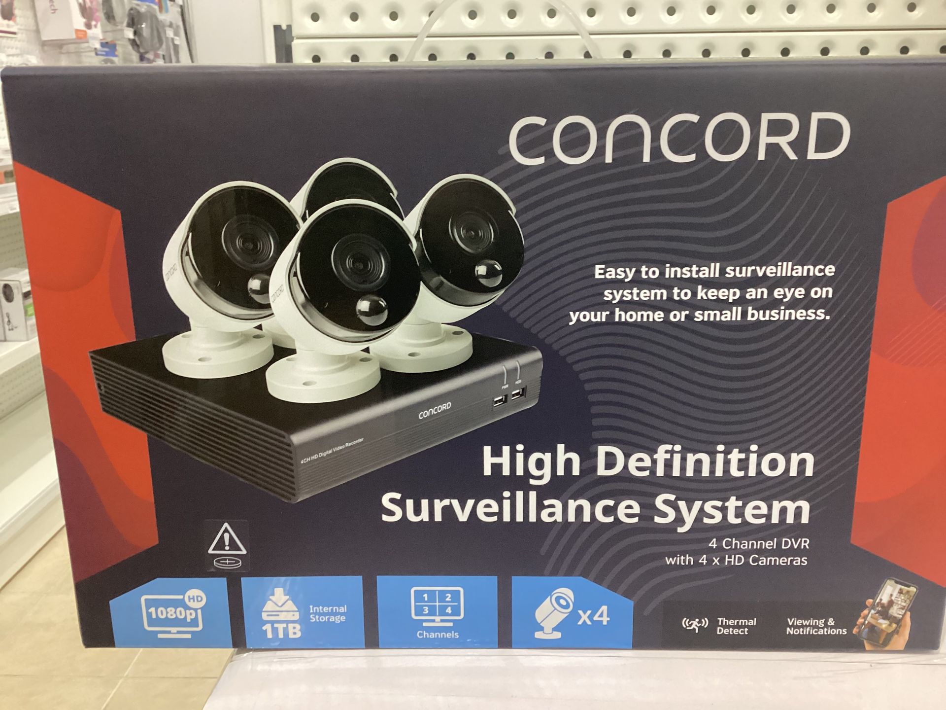 A Security Camera Is Mounted On The Side Of A Building — Dateline Computers Authorised Jaycar Reseller In Cannonvale, QLD