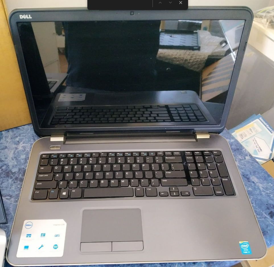 A Dell Laptop Is Open And Sitting On A Table — Dateline Computers Authorised Jaycar Reseller In Cannonvale, QLD