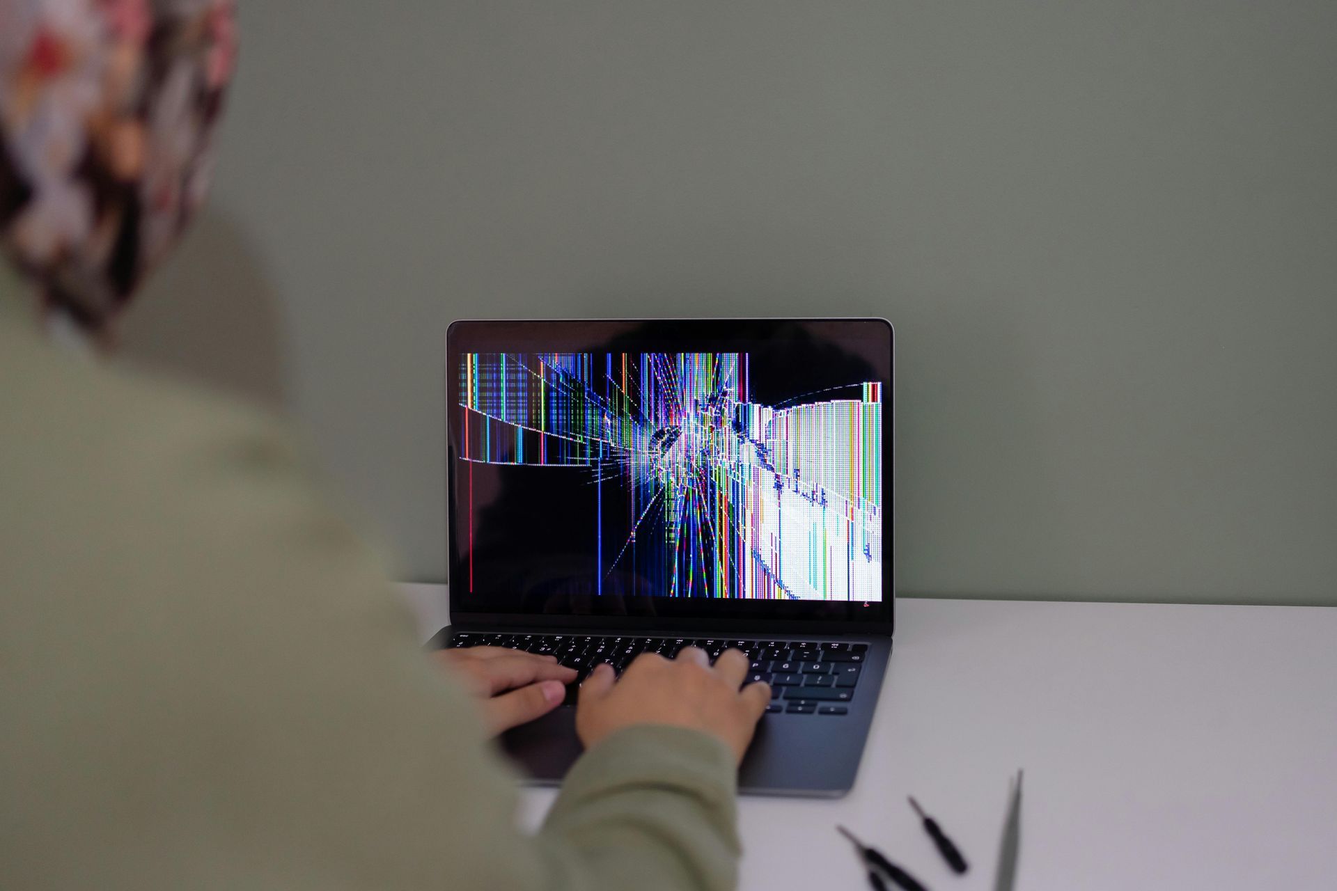 A Black Laptop is Open and Sitting on a Glass Table — Dateline Computers Authorised Jaycar Reseller In Bowen, QLD