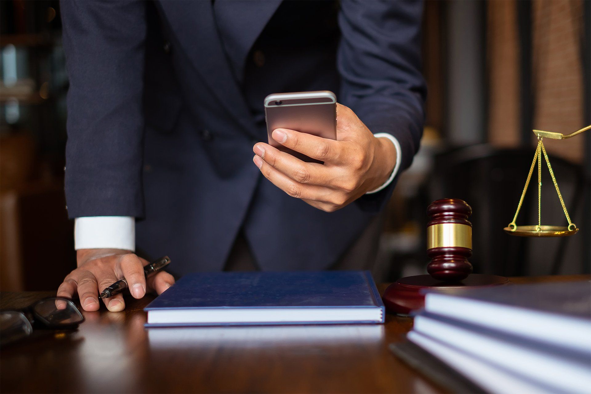 Lawyer Looking at His Phone