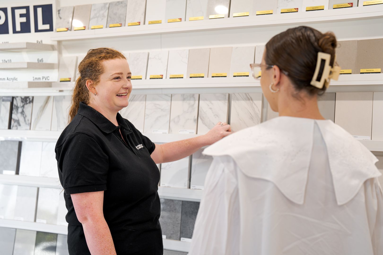 Team member with customer in Integrated Services Toowoomba showroom 