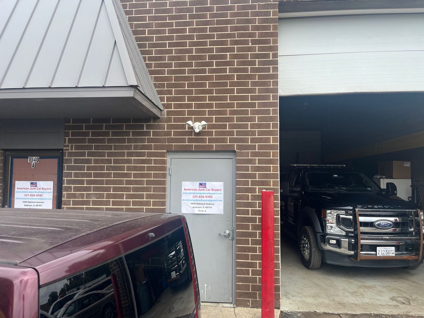 Image of the front door of American Junk Car Buyer's office in Addison, IL