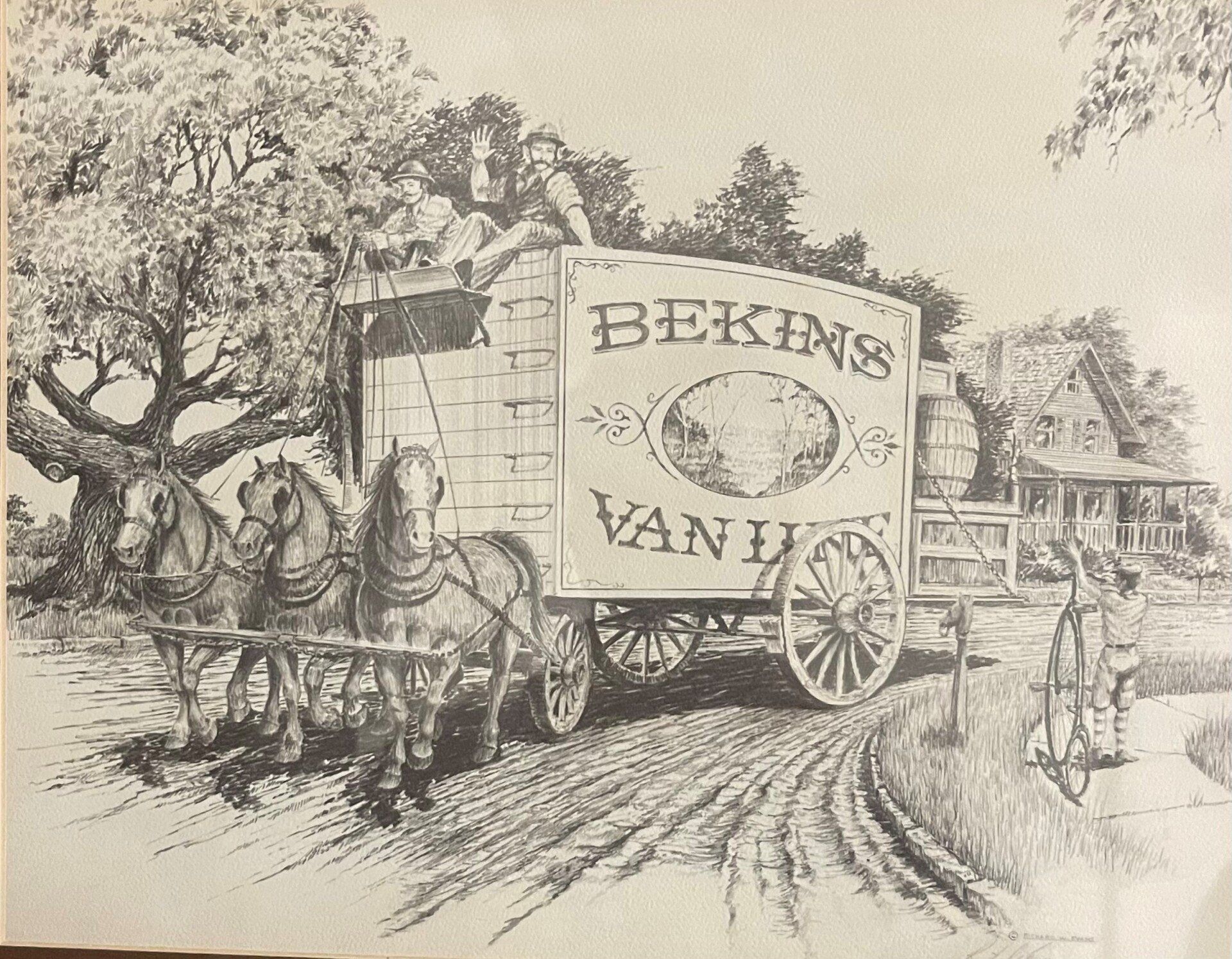 Horse-drawn Bekins Van & Storage wagon on a dirt road, trees and house in the background.