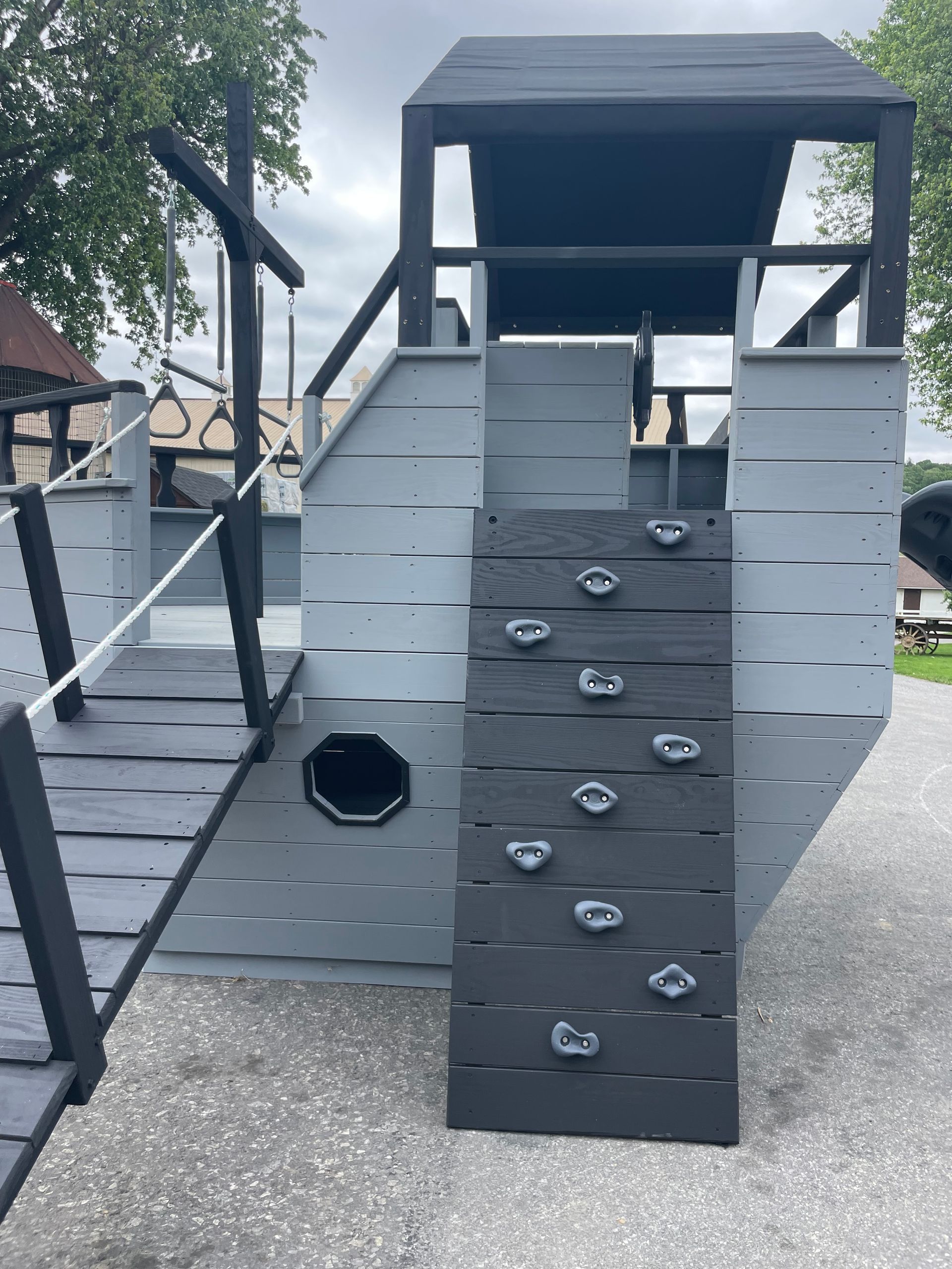 Amish-built custom playground with slide and swings