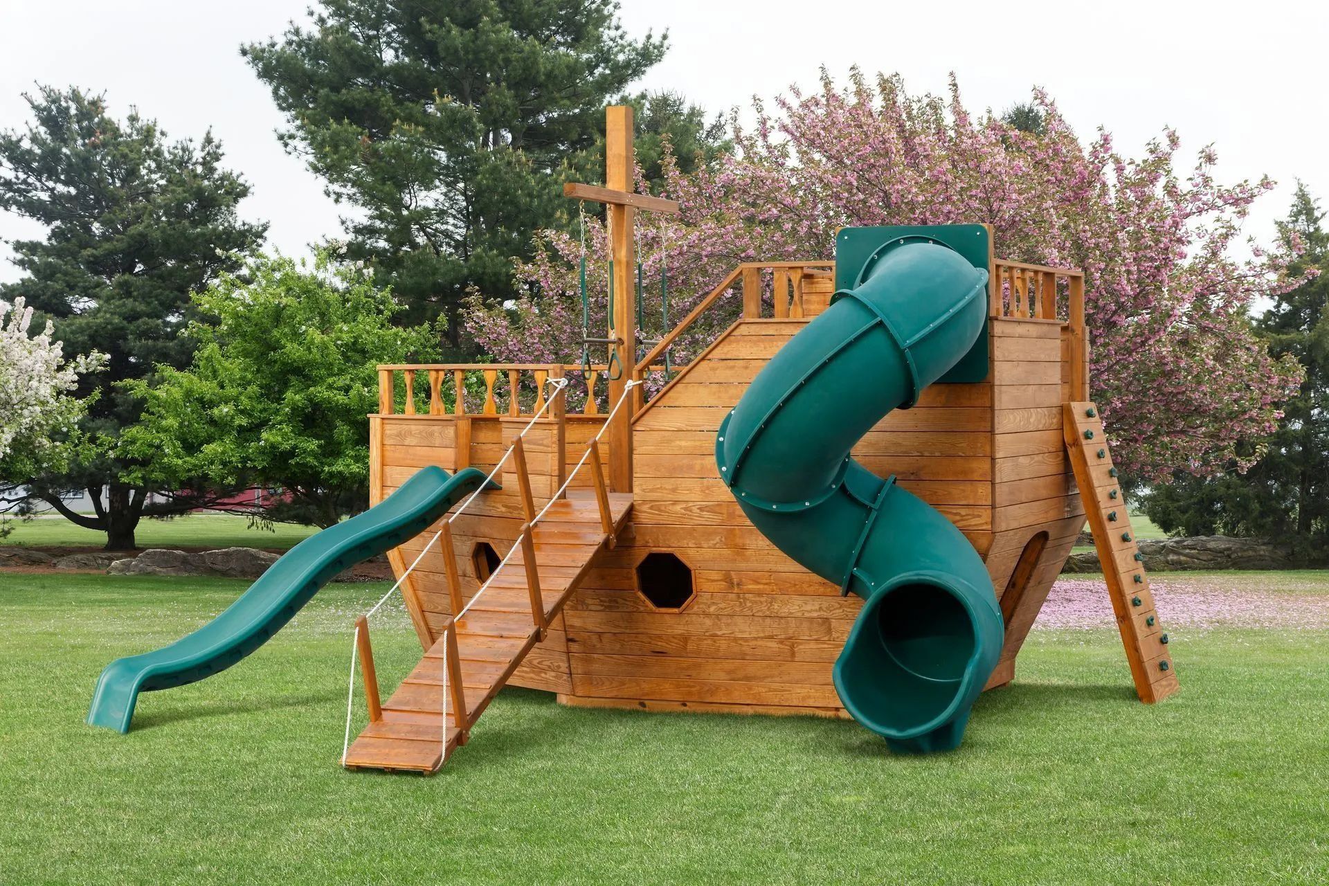 Custom wooden playground boat designed for imaginative outdoor play.