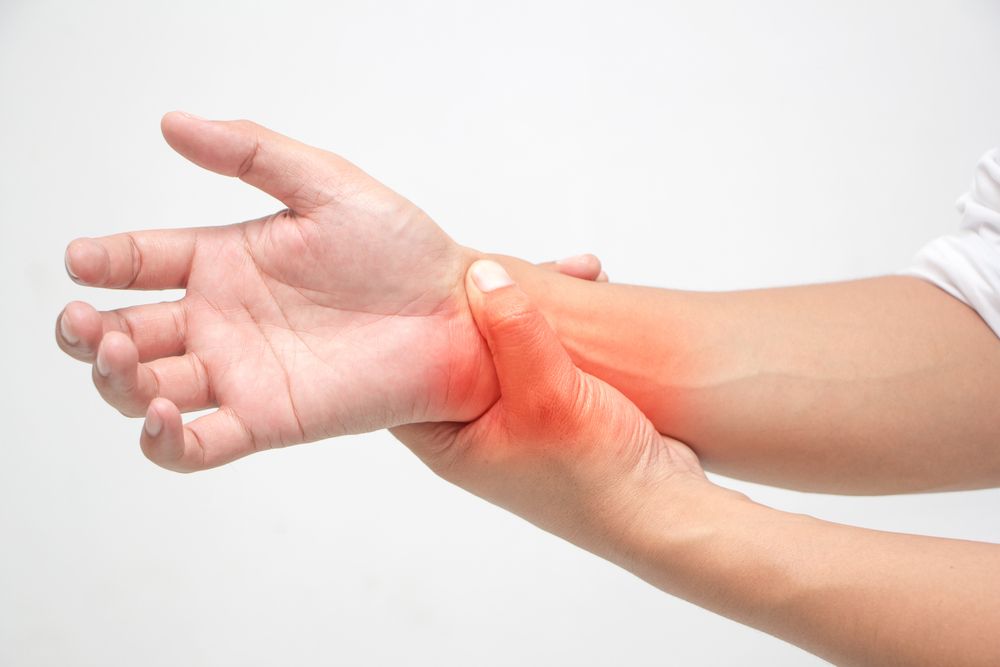A Hand Gripping the Opposite Wrist — Inner Balance Health in Coconut Grove, NT
